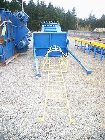 Used Wheelabrator?BCP 4 wheel roll conveyor machine